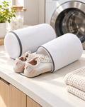 Sneaker wash bags in a bright minimalist laundry room